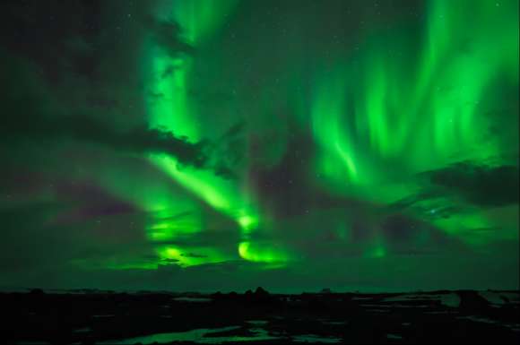 iceland-northern-lights-peeping-through-cloud-580x385_c